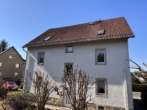 Mehrfamilienhaus mit Weitblick in ruhiger Lage von Freital - Rückansicht